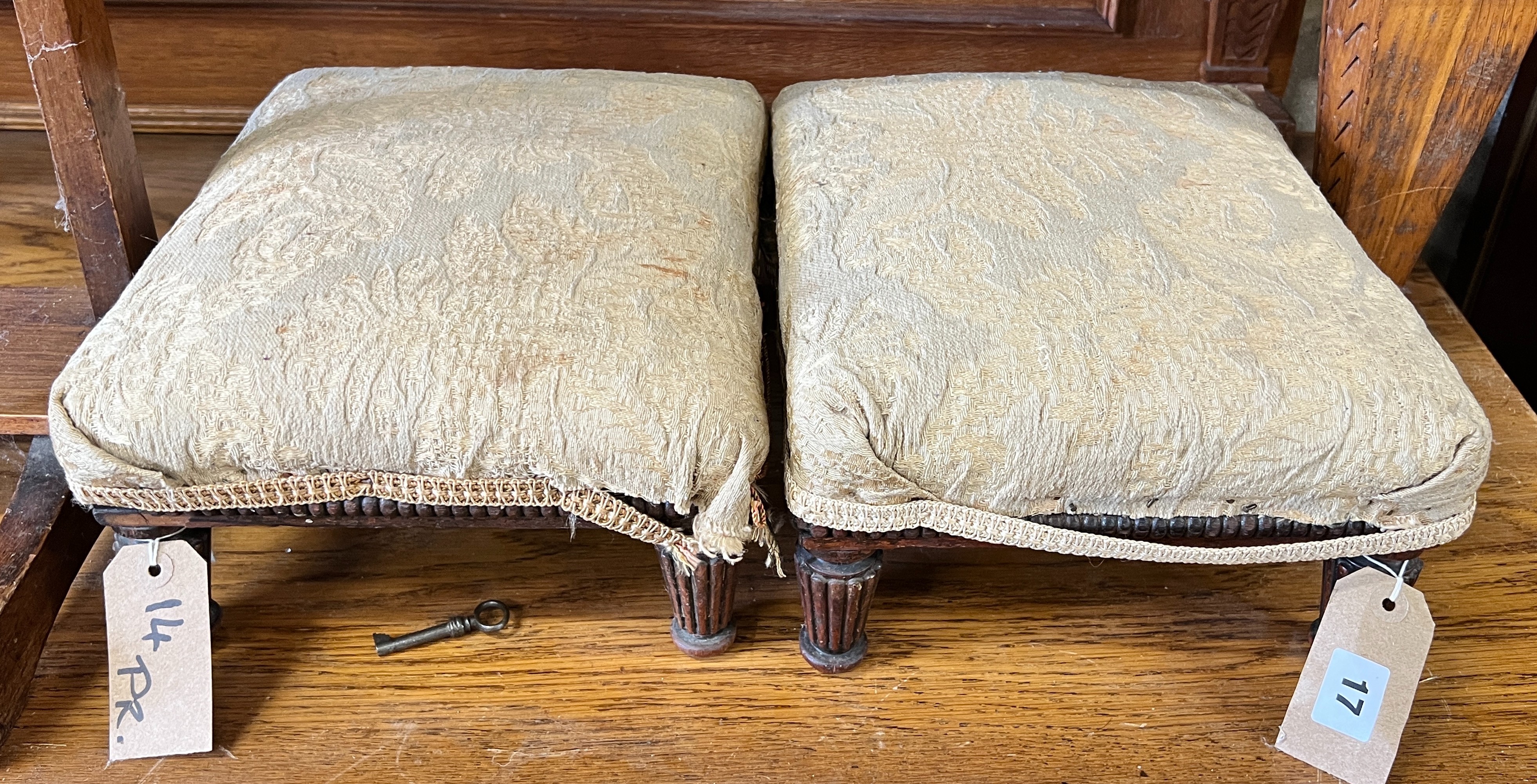 A pair of Victorian mahogany footstools, width 32cm, height 15cm